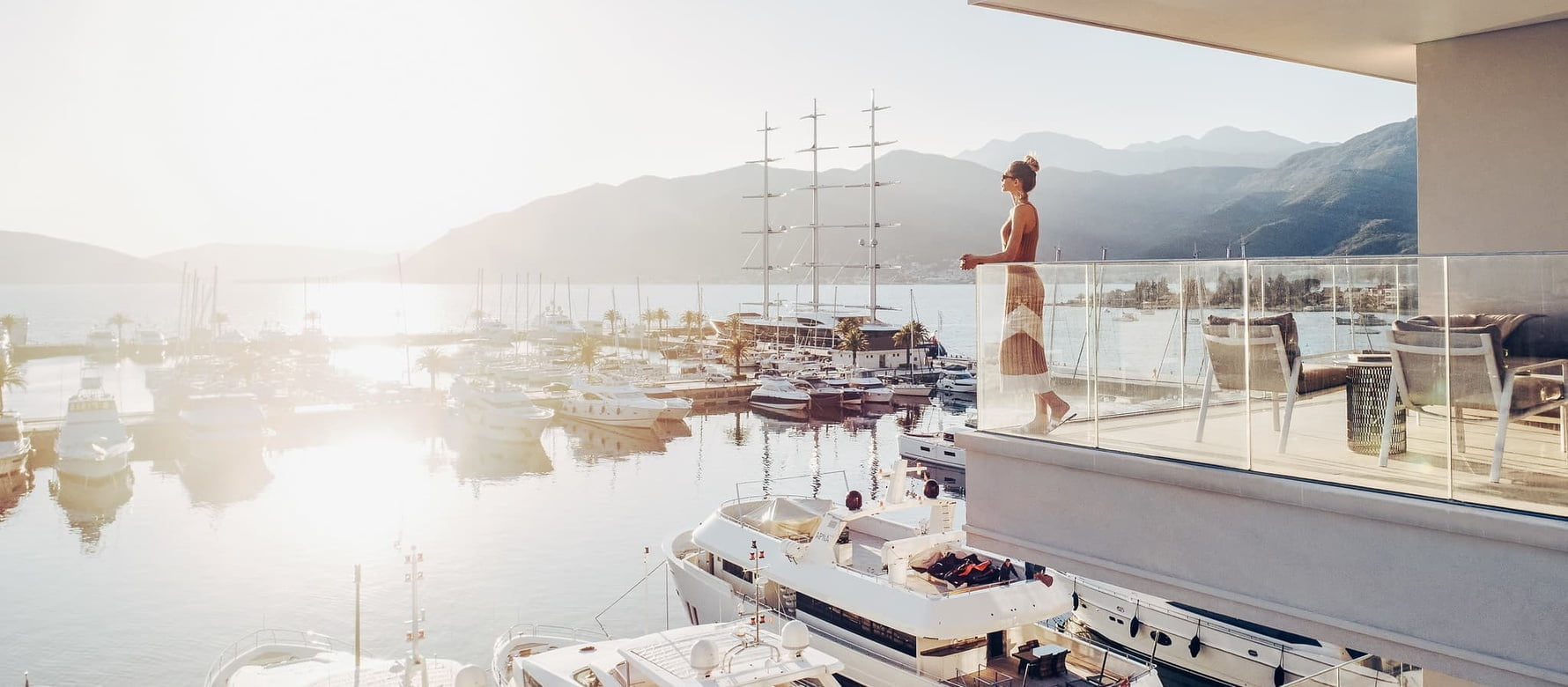 Woman overlooking marina in Porto Montenegro