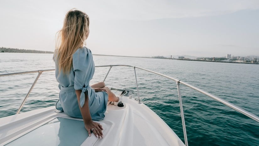 Girl sitting on a yacht