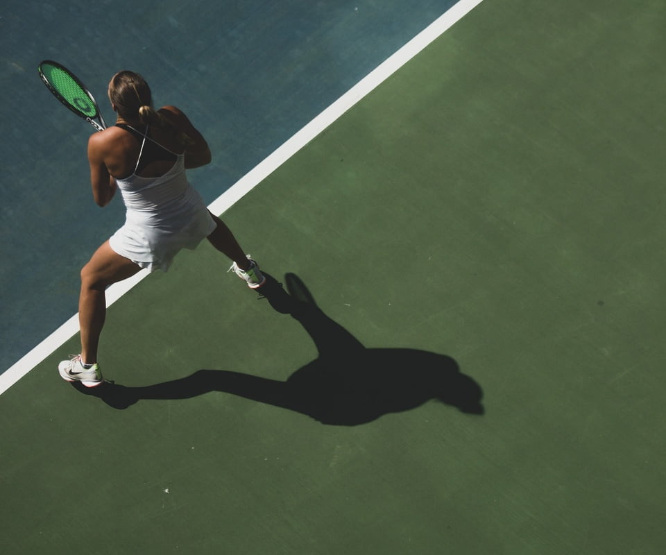 Woman playing tennis at Porto Montenegro